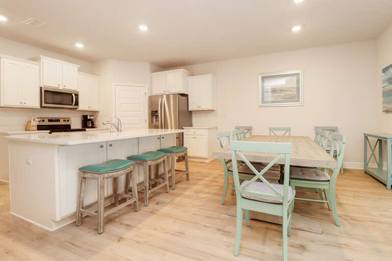 Kitchen with Bar Seating and Dining