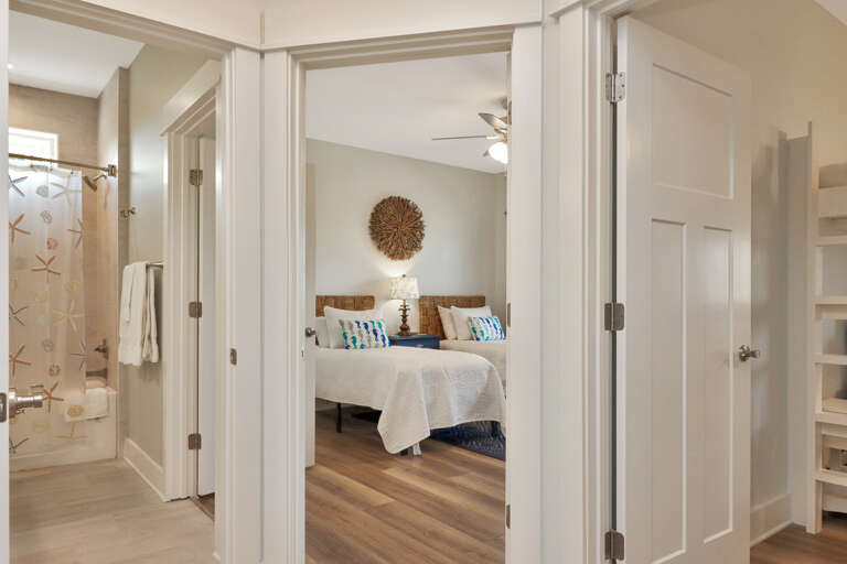 First Floor Hallway with Bedrooms 2 and 3 and Full Bath