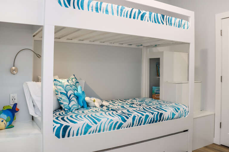 A Set of Bunks with Twin Trundle in Loft