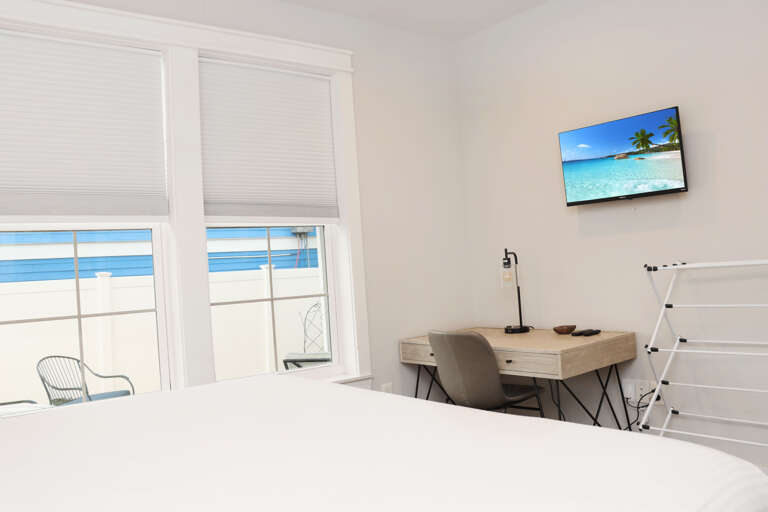 Bedroom 1 with TV and Work Desk