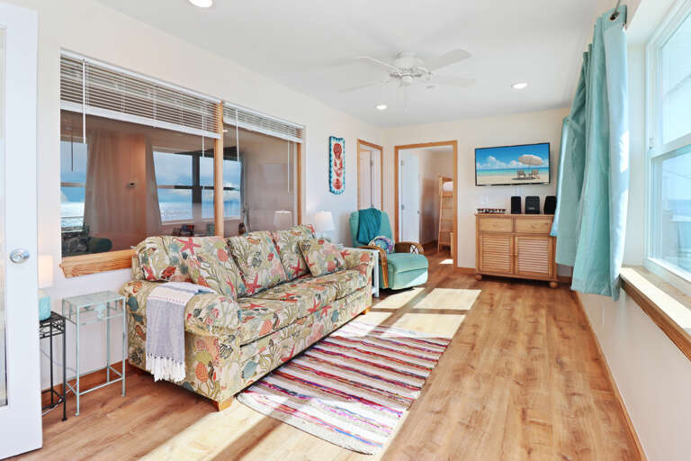 Den with TV and a View into Bedroom 1