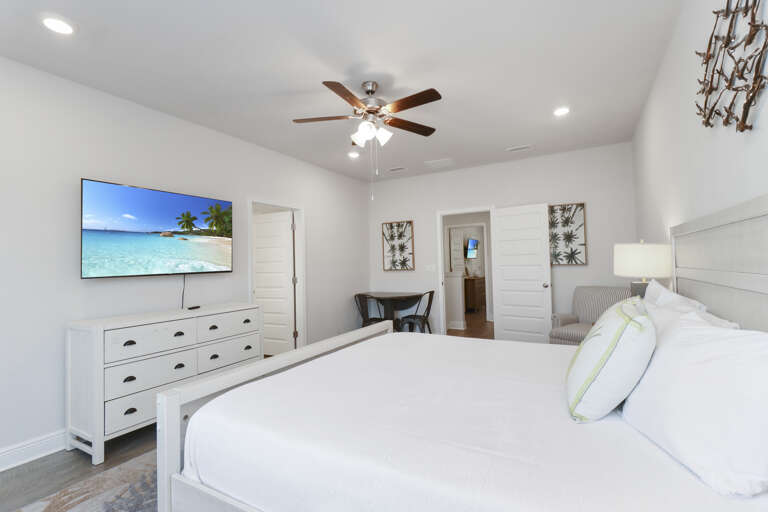 Bedroom 2 with TV and Master Bathroom