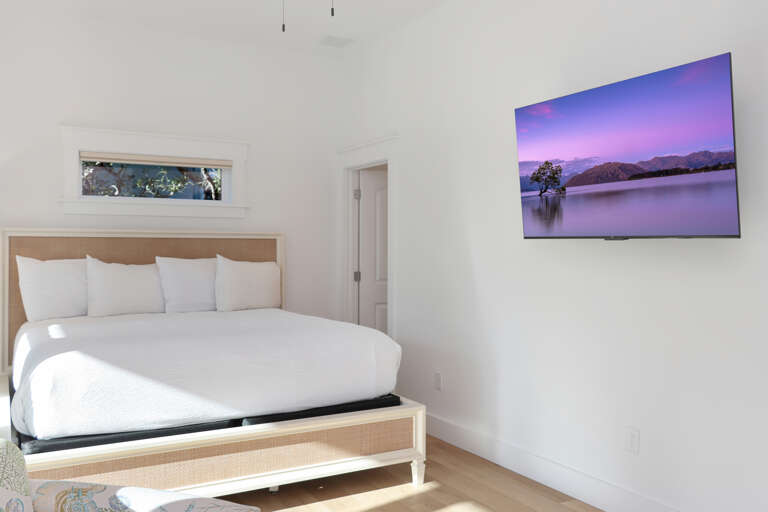 Bedroom 2 with TV and Master Bath