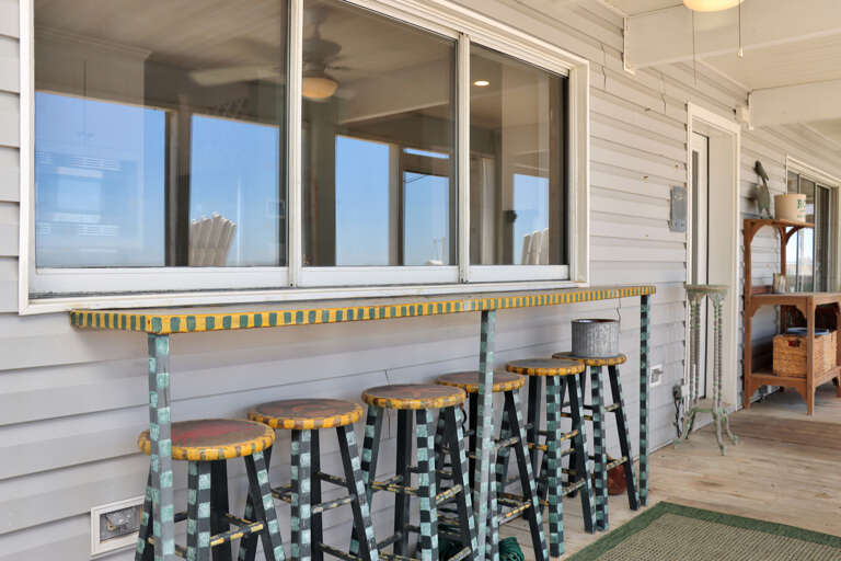 Unique Bar Seating with a View into the Kitchen