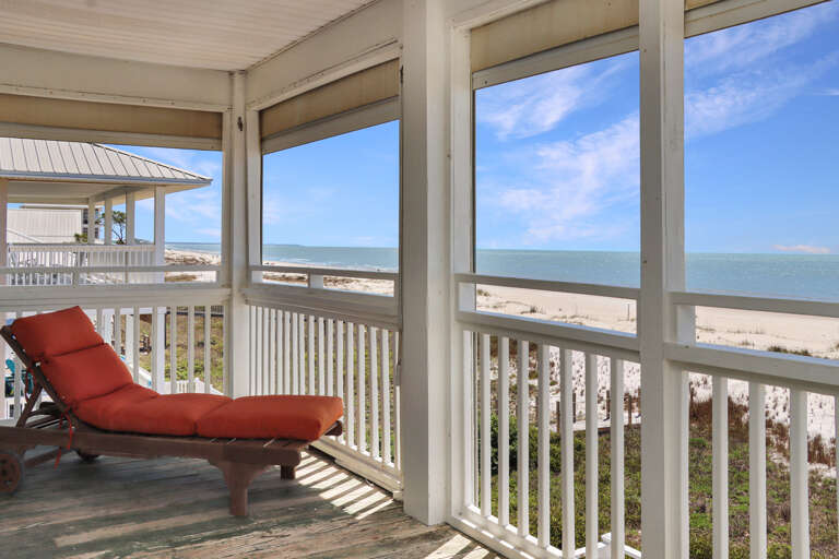 Lounging on Top Floor Beachfront Deck