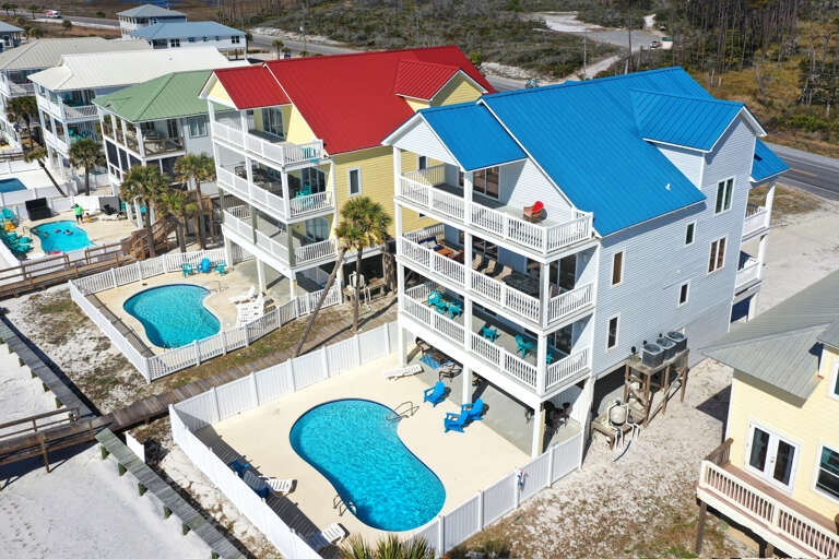 Multiple Decks Overlooking Beachfront Pool