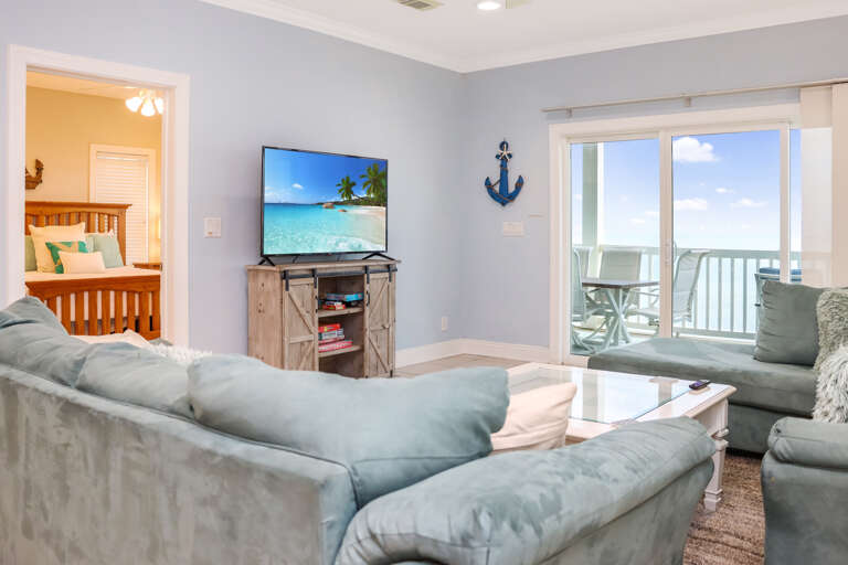 Beachfront Living Room with TV and View of Bedroom 3 Beachfront Living Room with TV and View of Bedroom 3