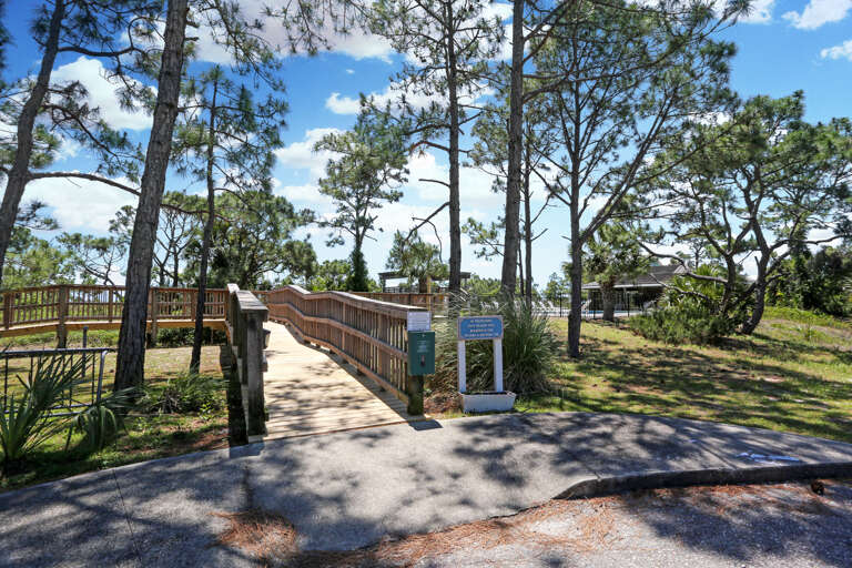 Community Boardwalk with Access to Beach and Pool