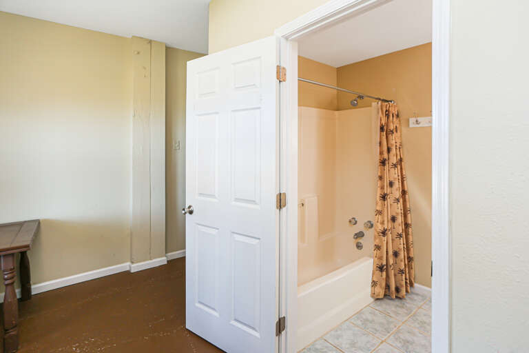 Ground Floor Separate Living Area - Full Bath Shower