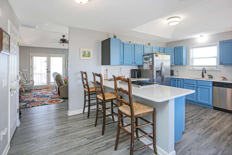 Kitchen Area Opens Up to Living Room Kitchen Area Opens Up to Living Room