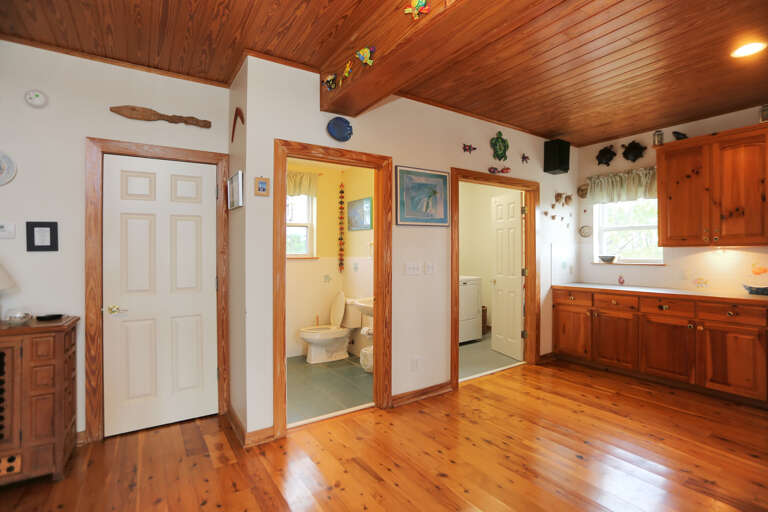 Kitchen with Half Bath & Laundry Room