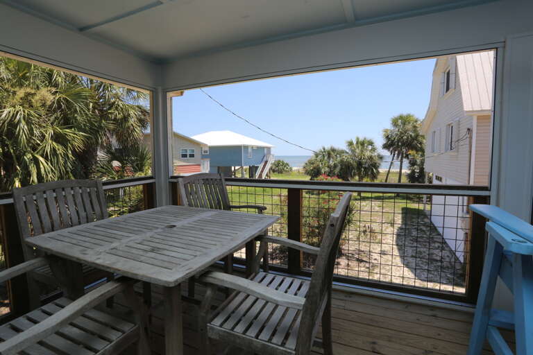 1st Floor Screened Deck Dining