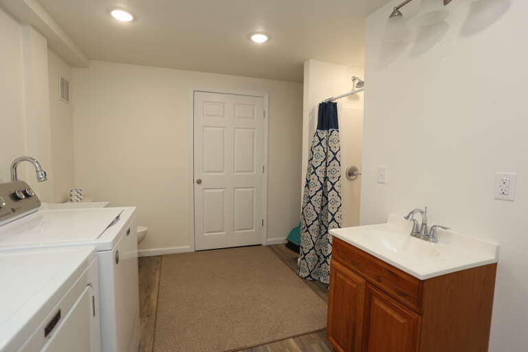 Full Bath & Laundry Under House