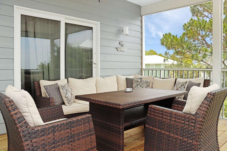Comfortable Seating and Dining on Screened Deck