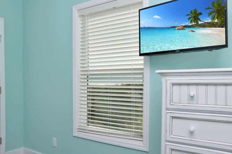Bedroom 1 with TV and Beach View Bedroom 1 with TV and Beach View
