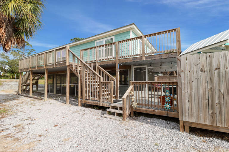 Side Exterior with Access to Beach View Deck and Screened Porch