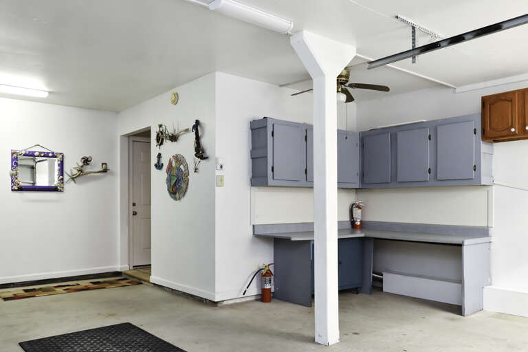 Garage with Main Entrance to the Interior of the House