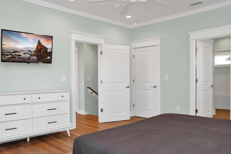 Bedroom 1 with TV and Master Bath