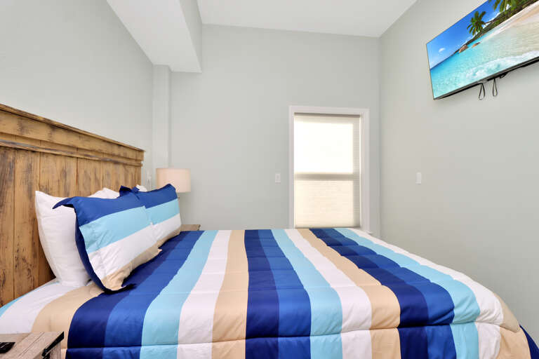 Dolphin Daze Hideaway - Bedroom 1 with TV