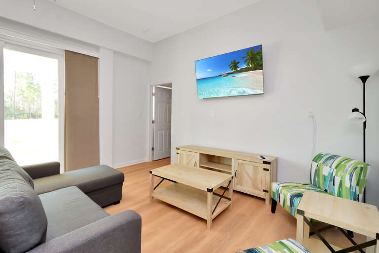 Dolphin Daze Hideaway - Living Room with TV