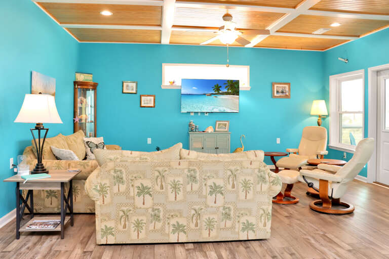 Spacious Living Room with Large TV