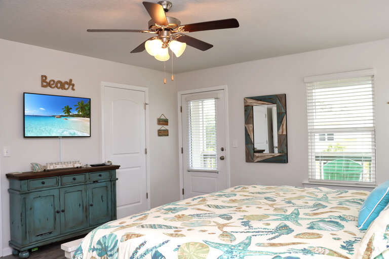 Bedroom 3 with TV and Screened Deck