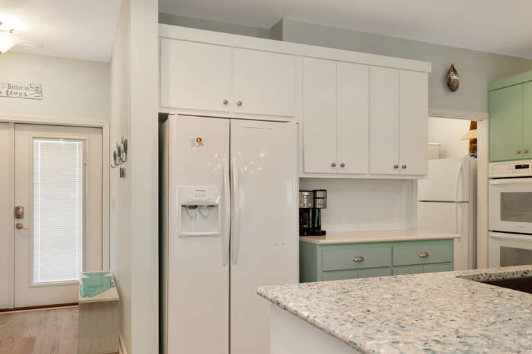 Kitchen with Laundry Room and Extra Fridge