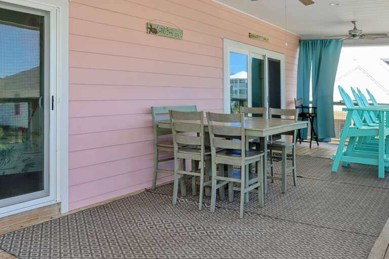 Main Floor Screened Deck with Outdoor Dining