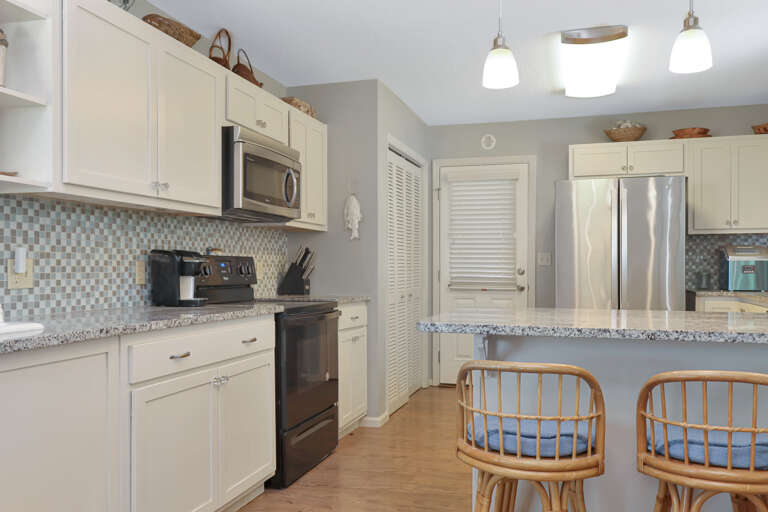 Kitchen with Door to Outdside Breezeway