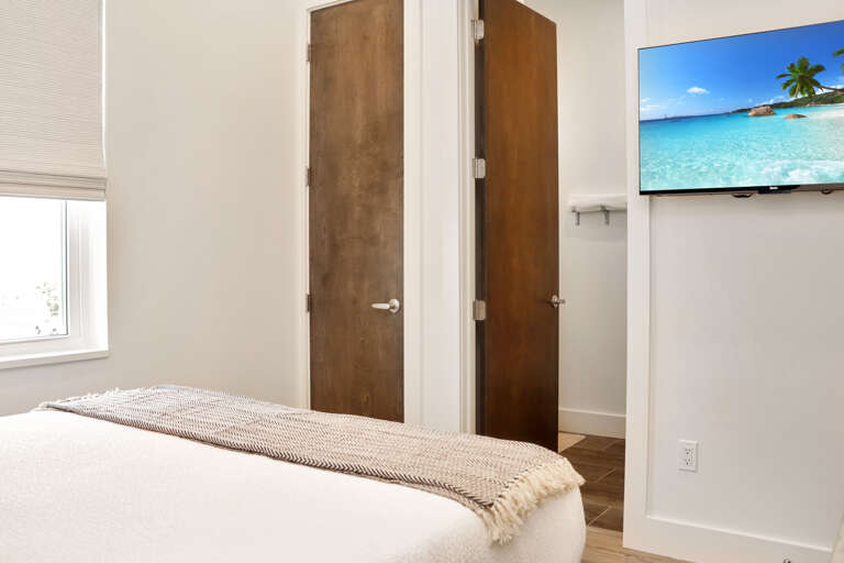 Bedroom 4 with TV and Master Bath