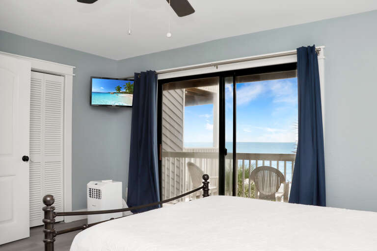 Bedroom 1 - Beachfront Deck and TV