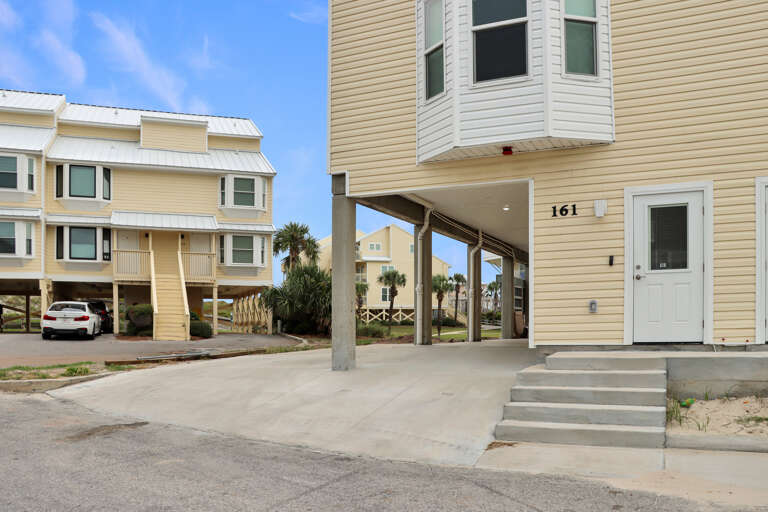 Two Parking Spaces, One Covered