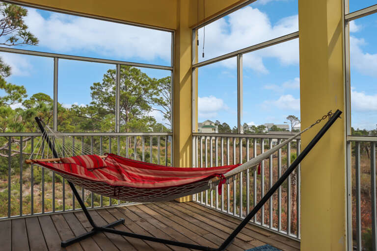 Hang out at the Screened Deck in Bedroom 1