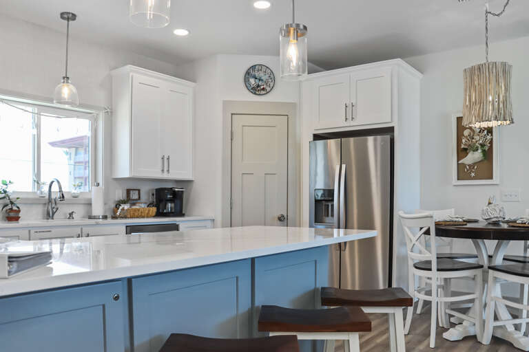 Kitchen with Bar Seating and Dining