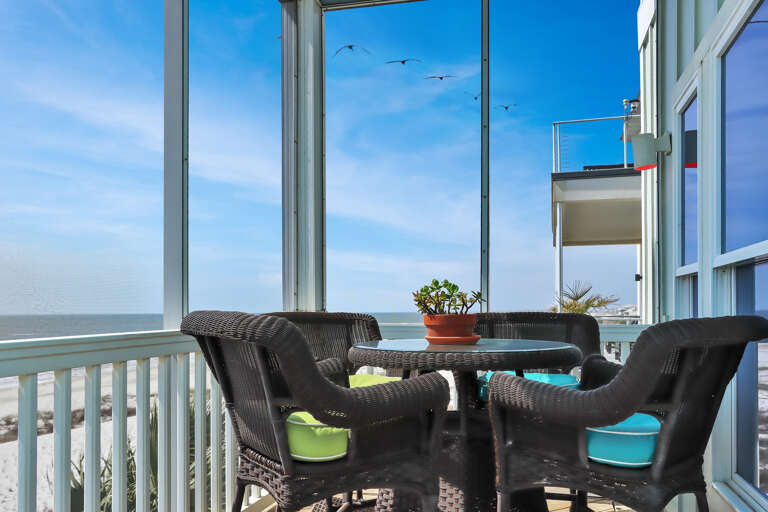 Outdoor Dining on Screened Beach Front Deck