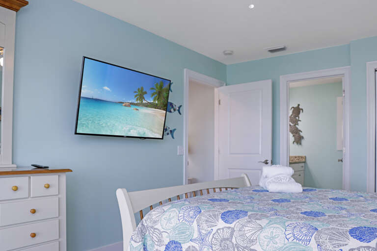 Bedroom 2 with TV and Full Bathroom