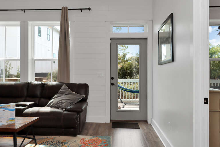 Downstairs Living Room with Back Deck Entrance