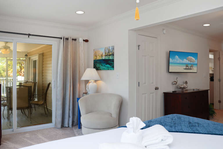 Bedroom 1 with Beach View Screened Deck
