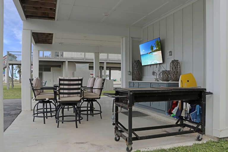 Outdoor Grilling Area with TV