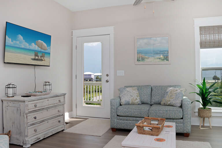 Living Room with TV and Beach View Deck