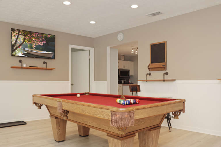 Game Room with Pool Table and TV