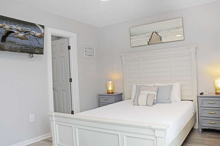 Bedroom 1 with TV and Master Bathroom