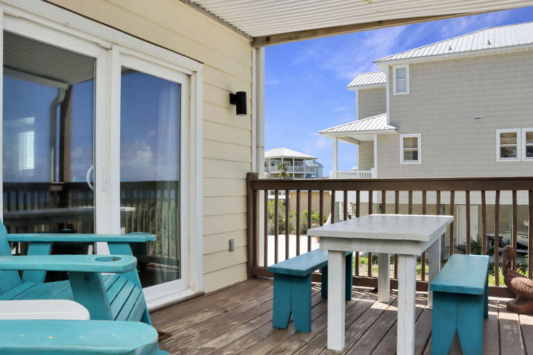 Covered Beachfront Deck on Main Floor Covered Beachfront Deck on Main Floor