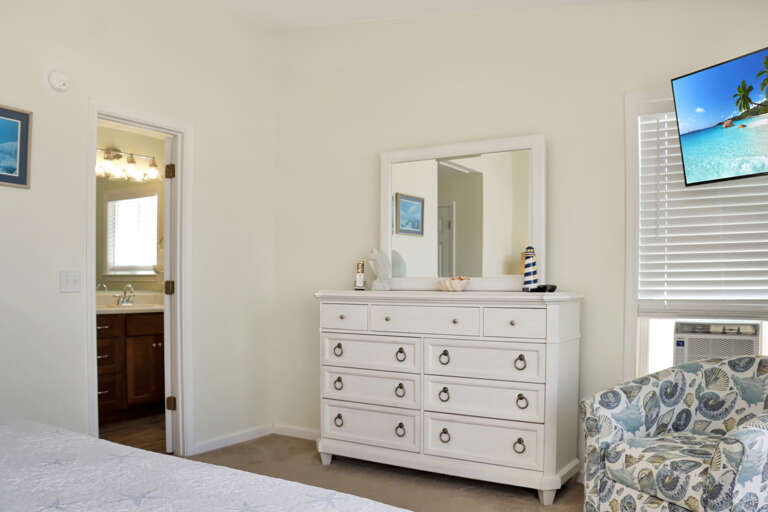 Bedroom 2 with TV and Master Bathroom
