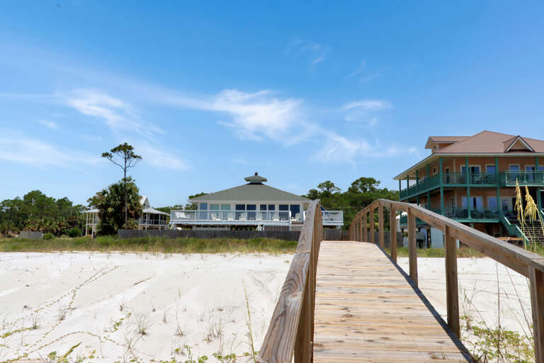 Beachfront exterior with private boardwalk