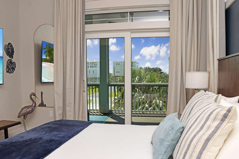 Bedroom 2 with View onto Screened Deck