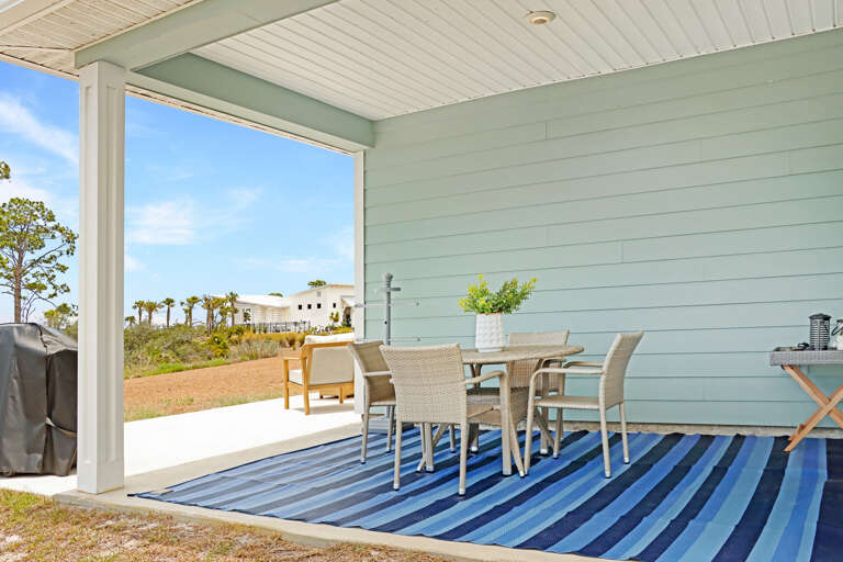 Covered Back Porch with Outdoor Dining Covered Back Porch with Outdoor Dining