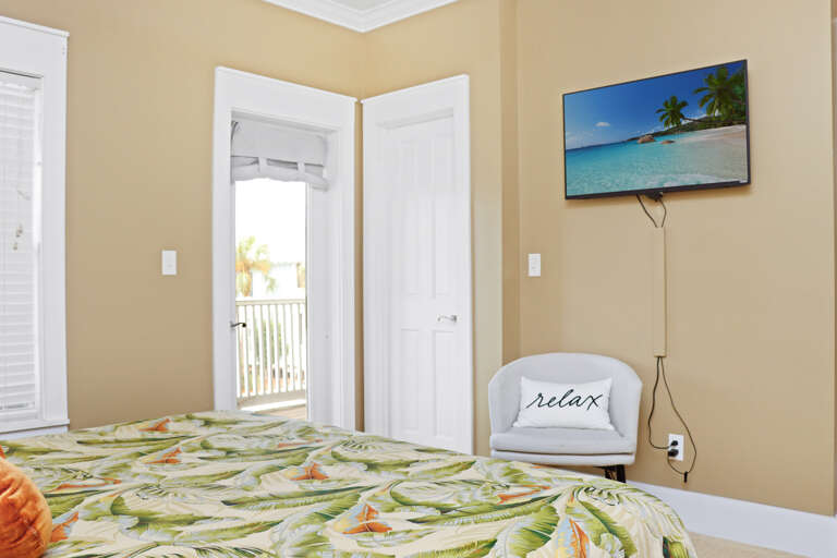 Primary bedroom with flat-screen TV