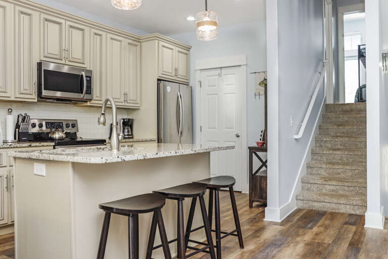 Kitchen and Stairs to Second Floor