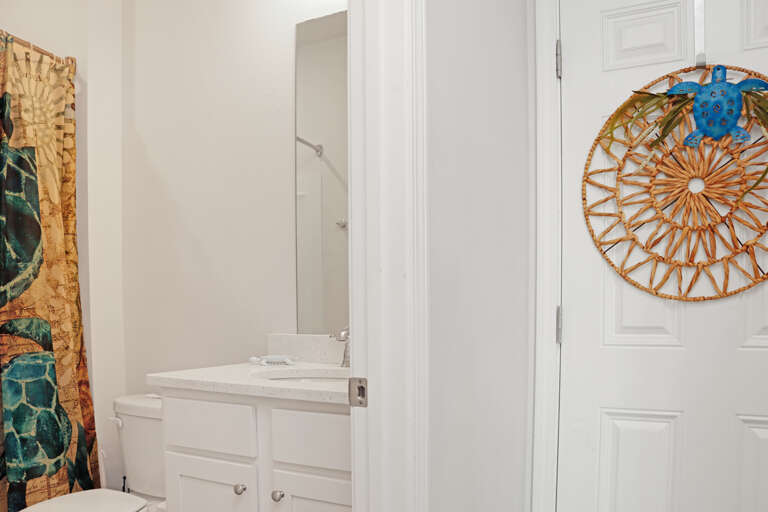 Full Bathroom and Garage Entrance